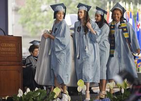 Emma Sulkowitz (left) graduates from Columbia University