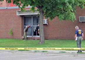 Damage from a bomb thrown in the window of the Bloomington mosque